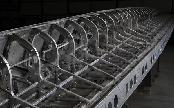 Aluminum ribs and spars forming the internal skeleton of an aircraft wing