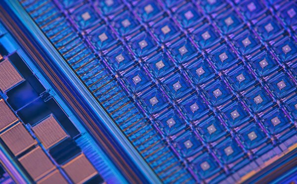 Macro view of a phase-change memory chip die with a microscopic crosspoint array