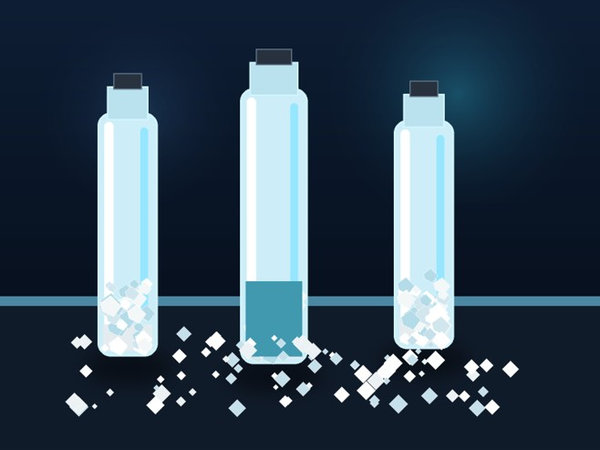 Laboratory vials containing crystalline organic ammonium halide powders on a clean materials bench.